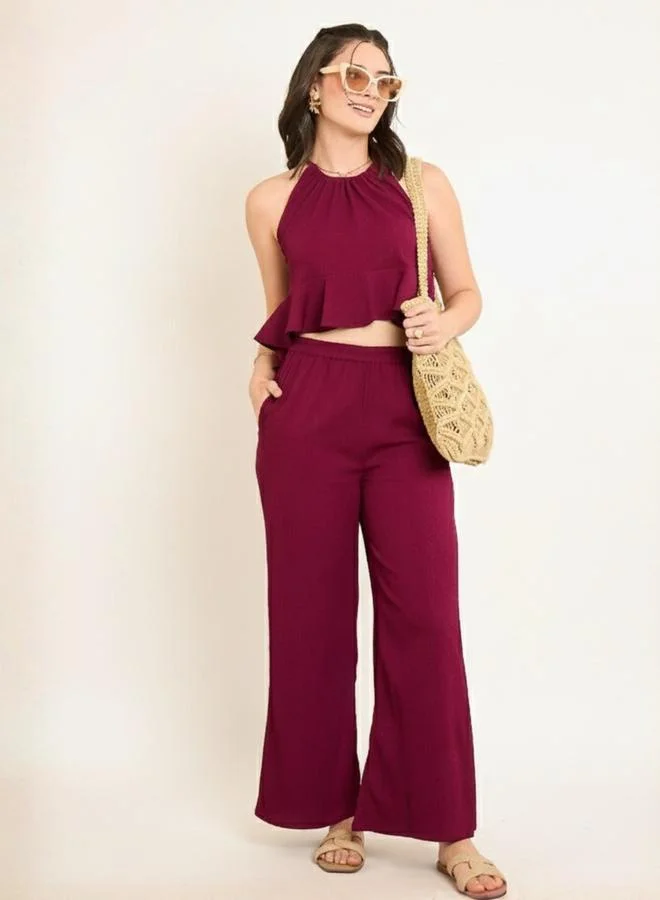 WineRed طقم منسق بلوزة كروب بياقة هولتر وبنطال